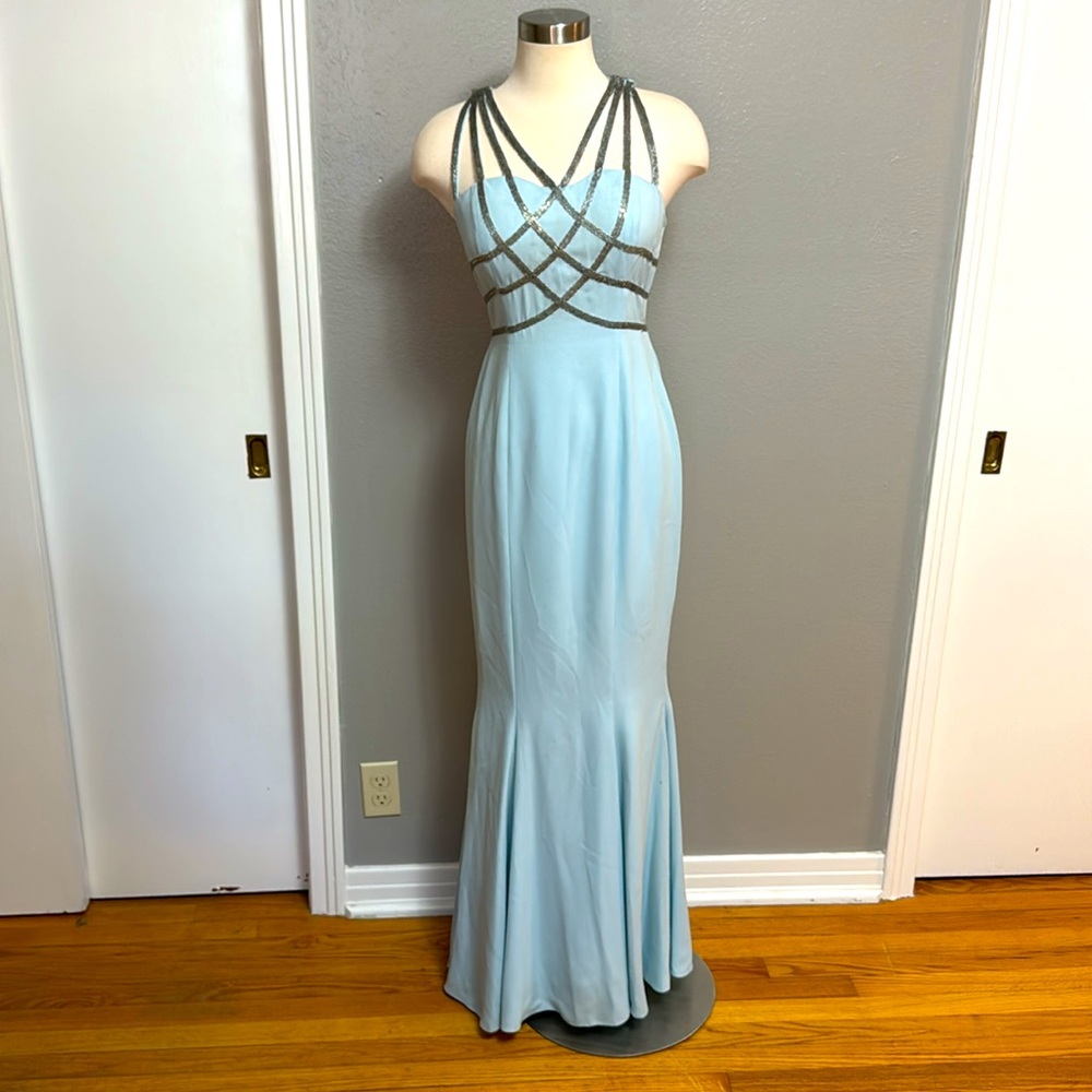 Light blue gown with unique silver beaded straps by Cire: a division of Landa